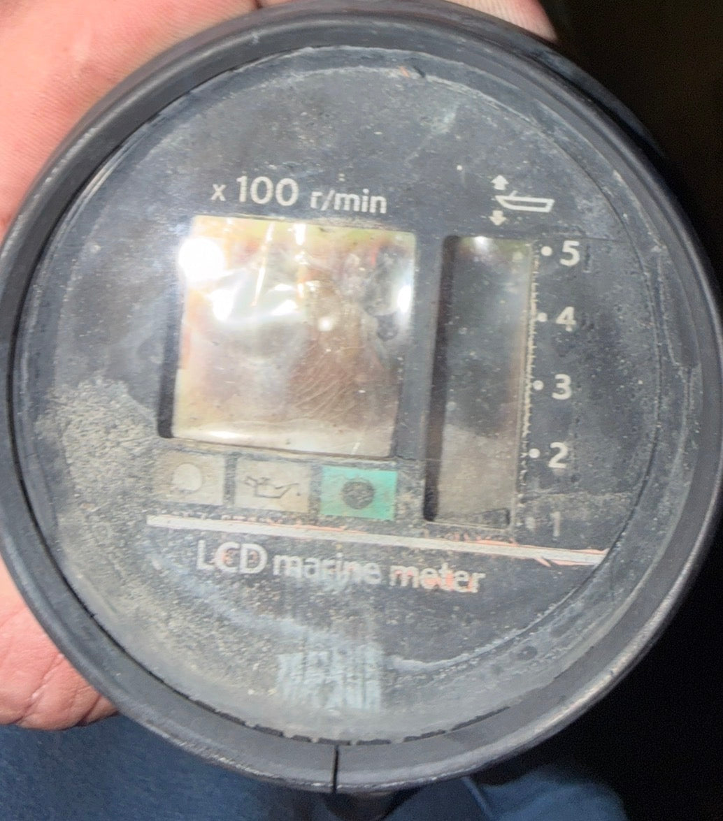 Early Yamaha LCD marine tachometer before restoration with faded display